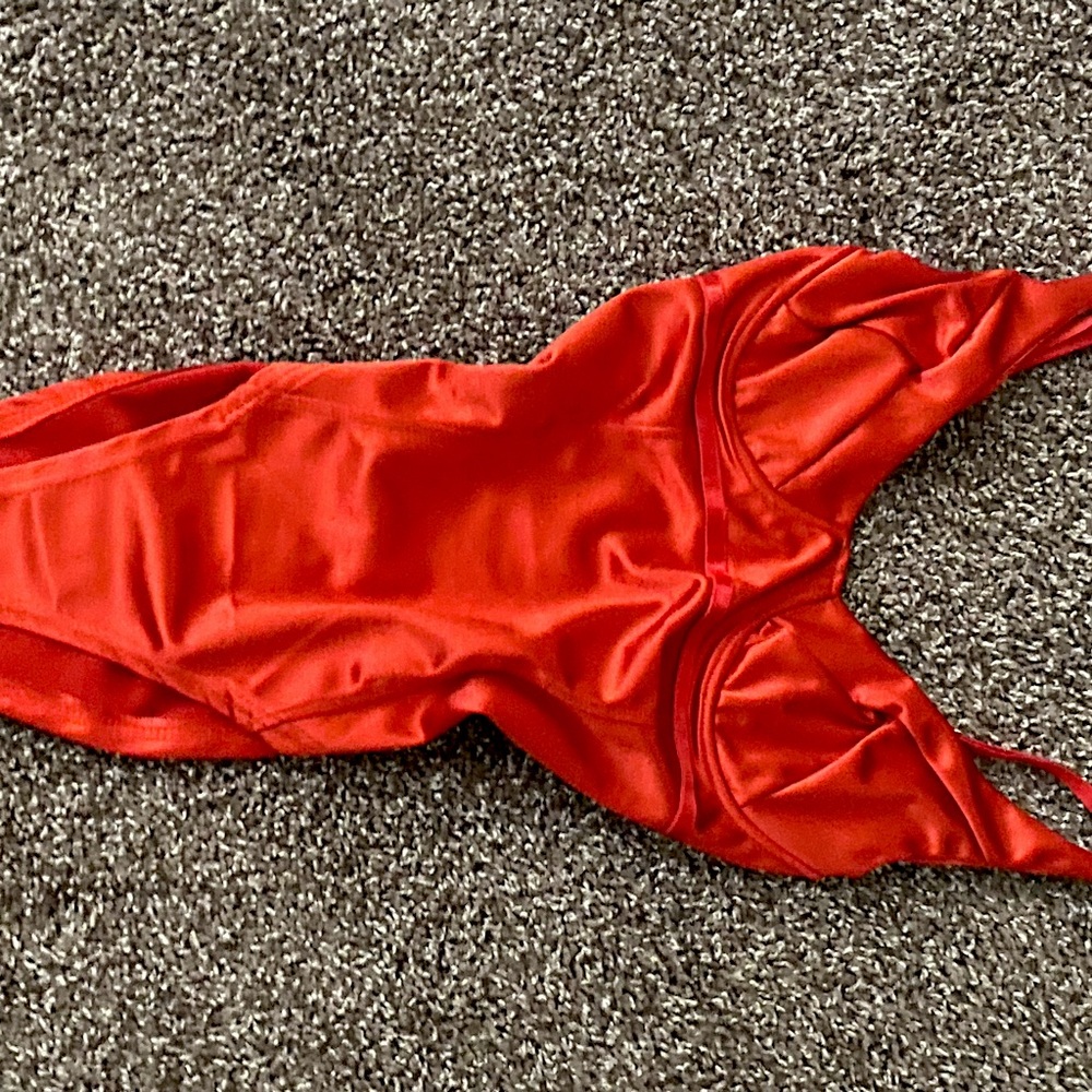 red bodysuit